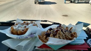 Lunch of champions: pulled pork fries and funnel cake.