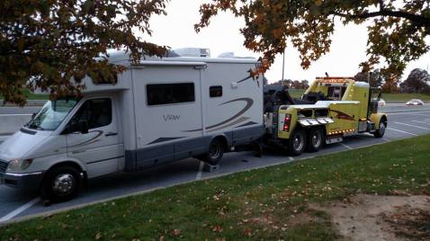 Abby being towed from the EZ-Pass administration building parking lot.